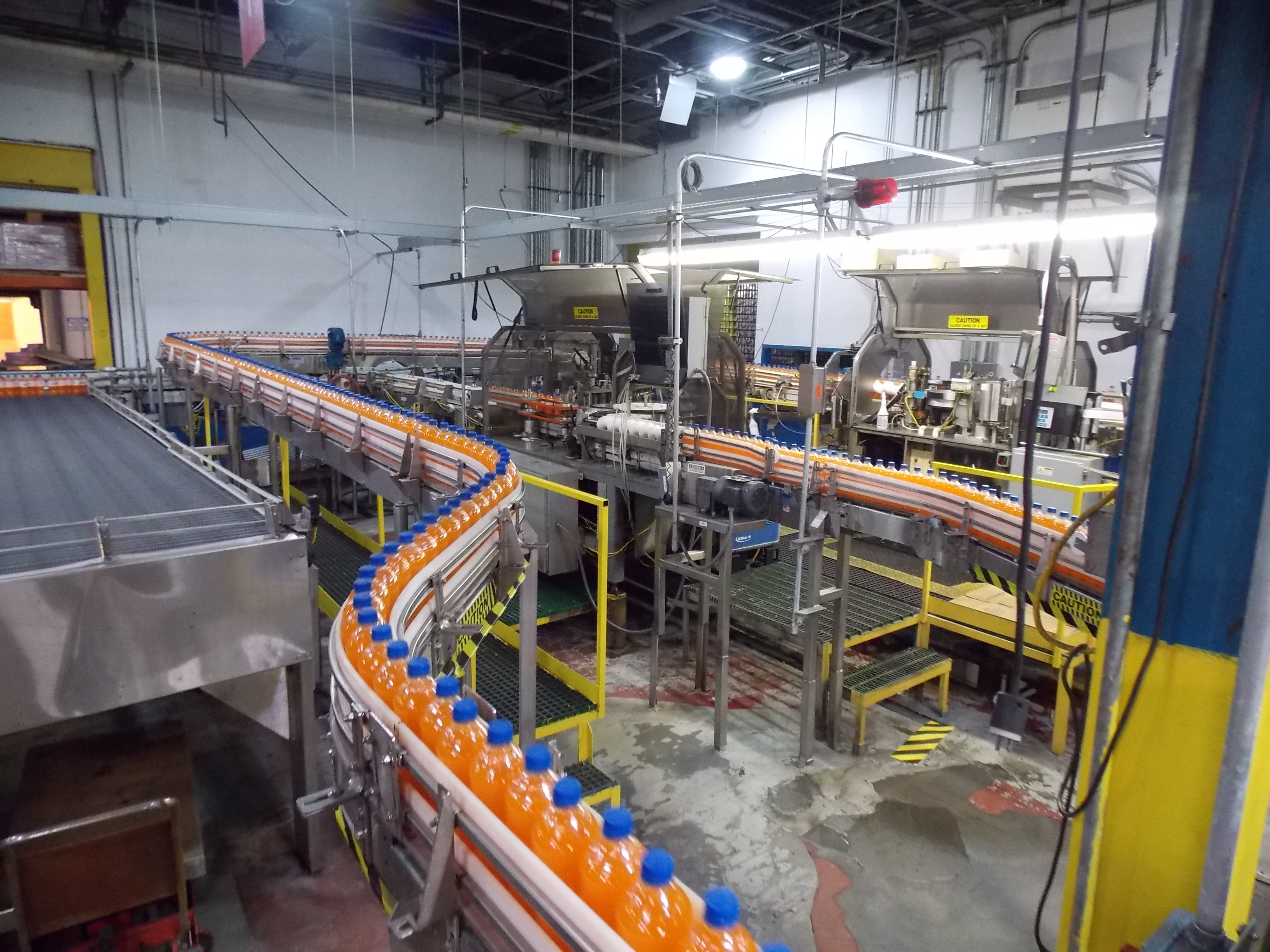 Ambec Assorted Full Bottle Conveyor United Food & Beverage